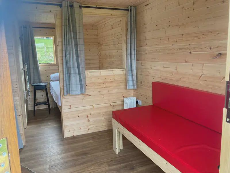 Hut interior with bench
