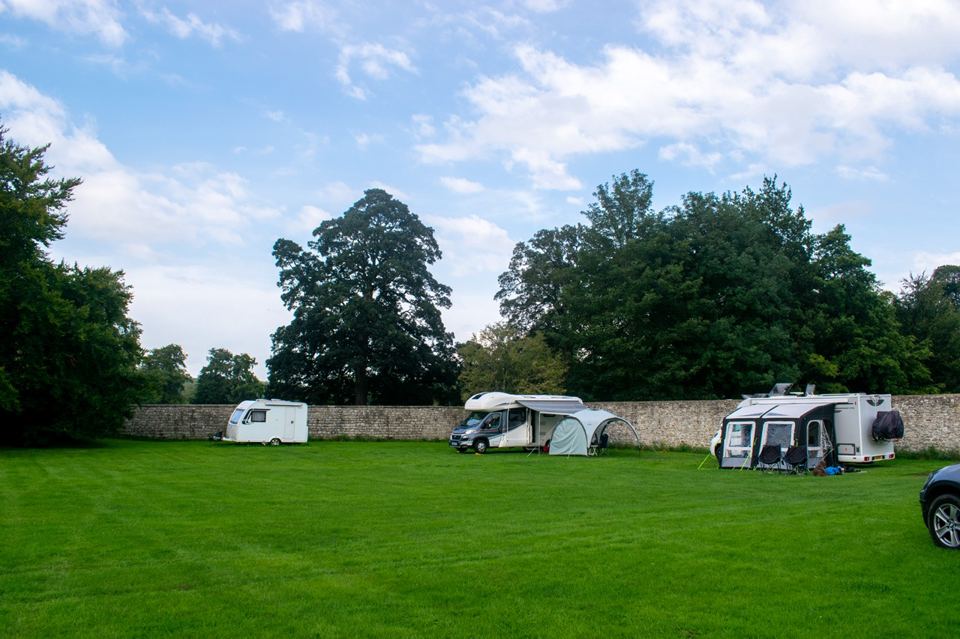 Vans along the walled garden