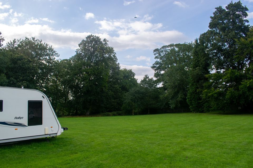 Caravan among the trees