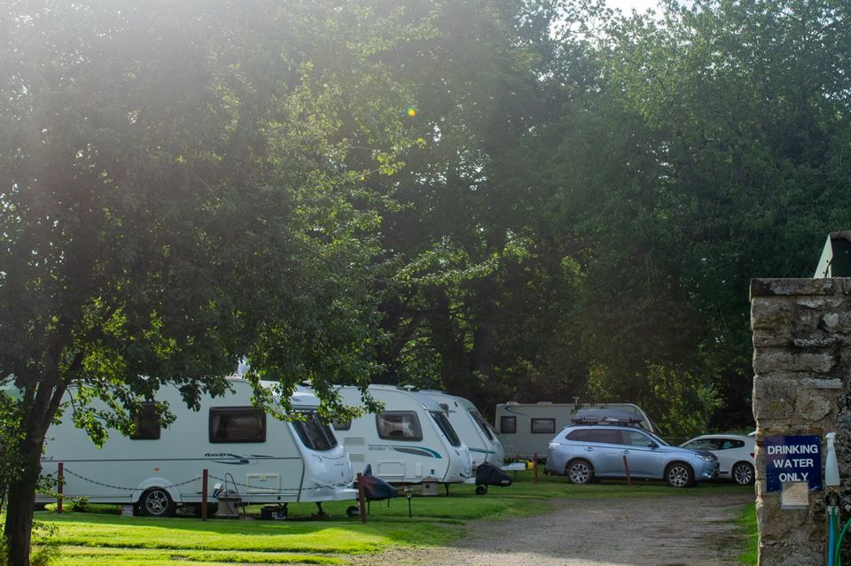 Pitches by the stone gateway
