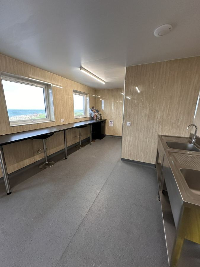 Washing-up room with sea window
