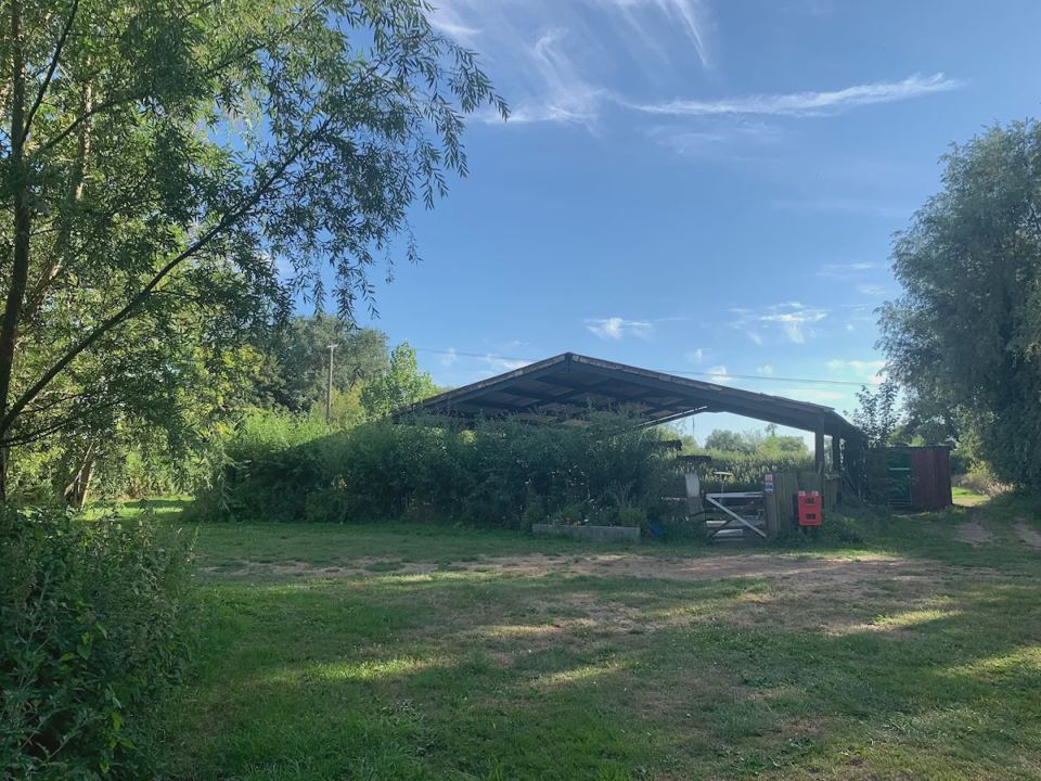Farm building at the field edge