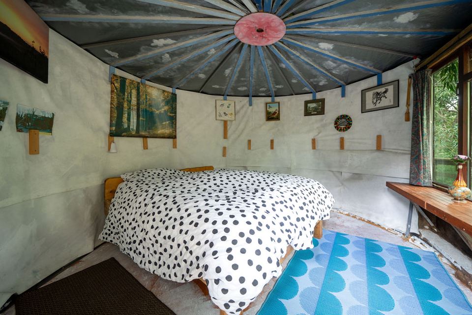 Bed inside a yurt