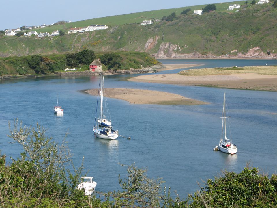 Estuary with moored boats