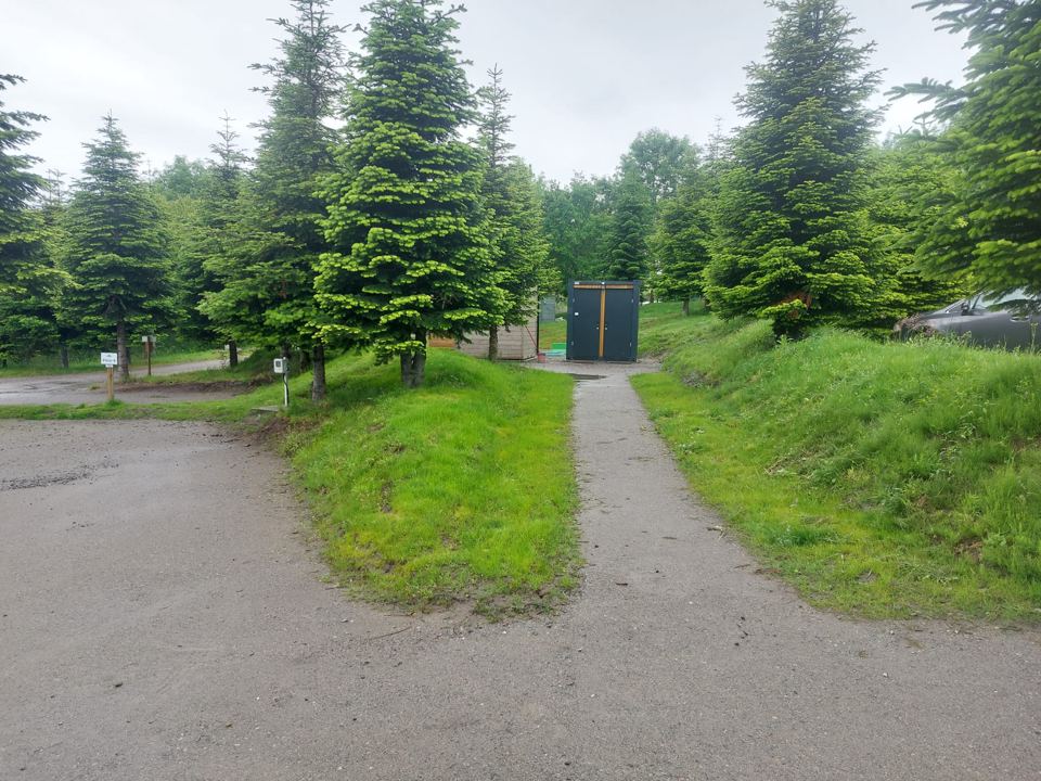 Pitch with a service building