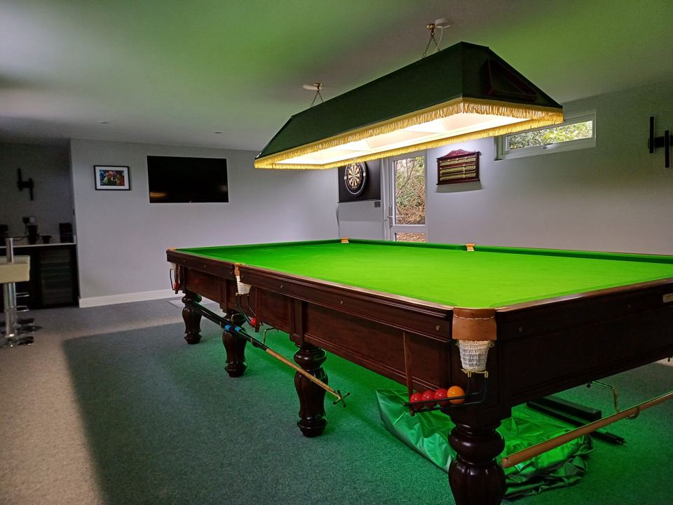 Snooker table in games room