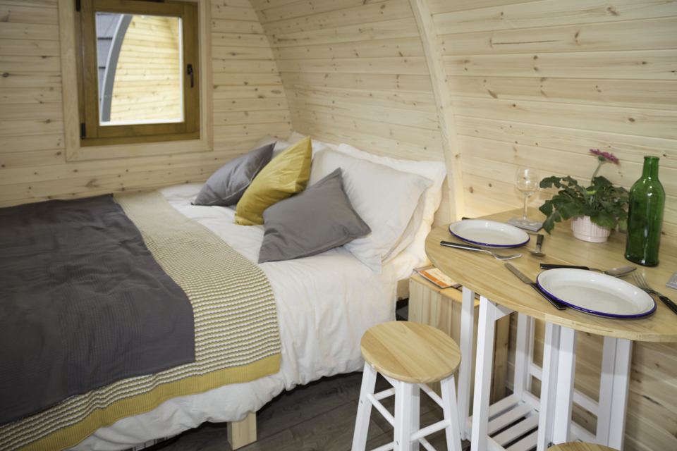 Double bed inside a pod