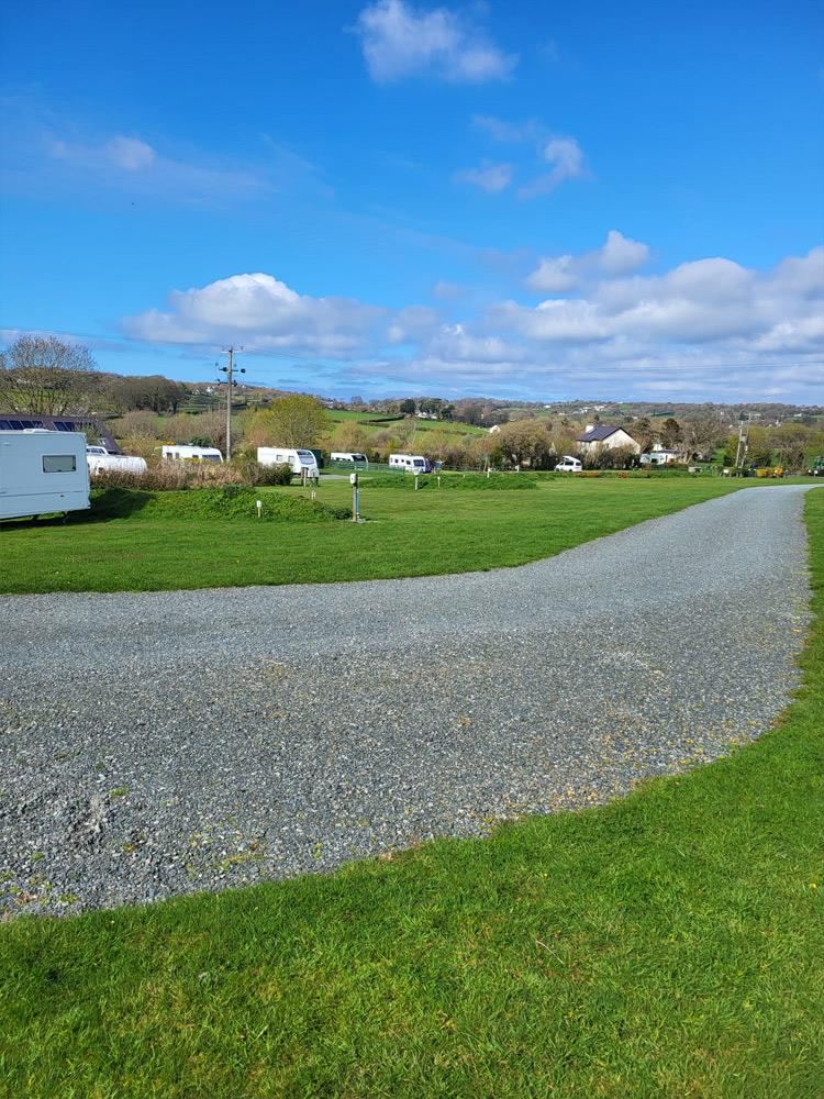 Gravel track beside grass
