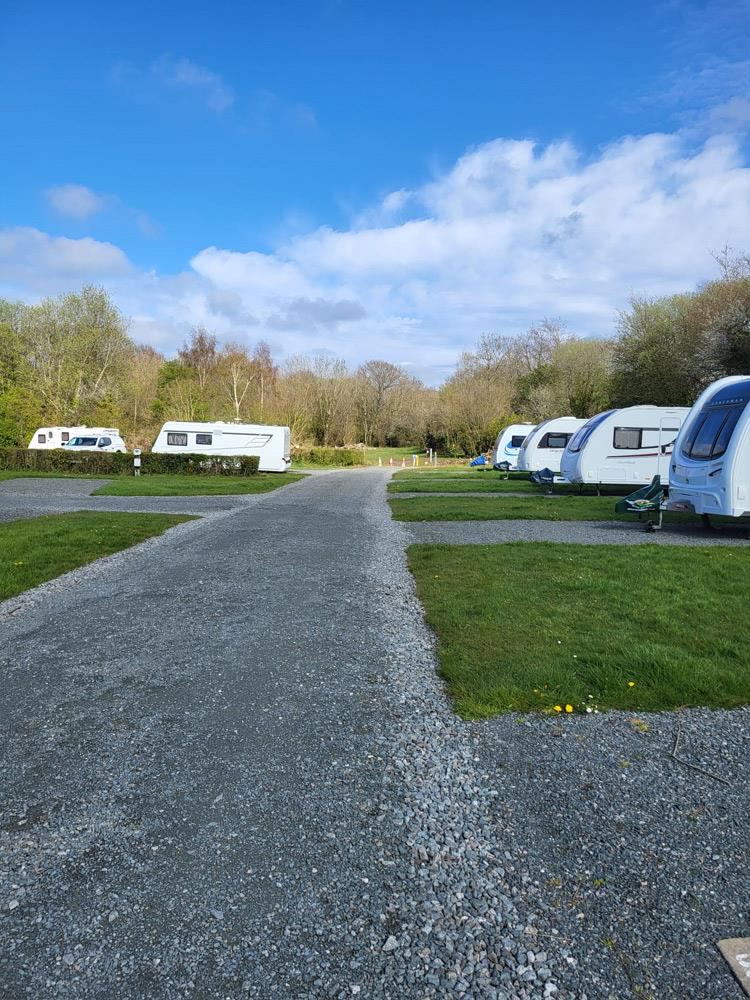 Gravel road past tourers