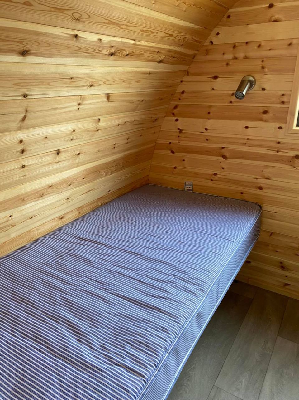 Single bed in a pod