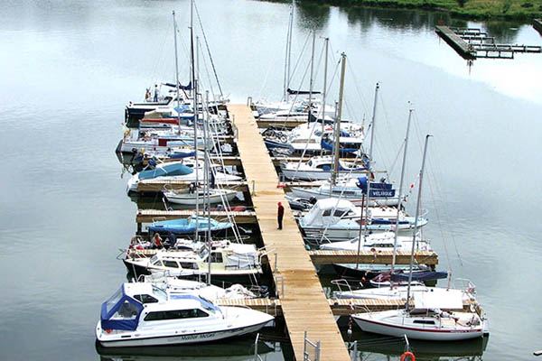Boats moored at the marina