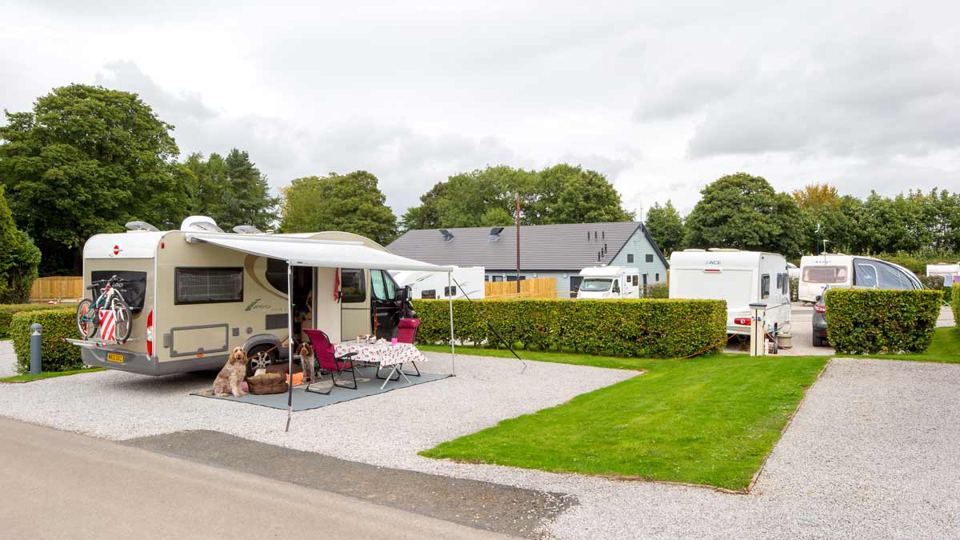 Hardstanding pitch with awning