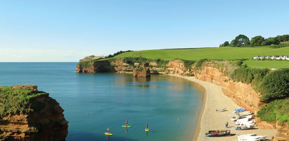Cove and beach below the red cliffs
