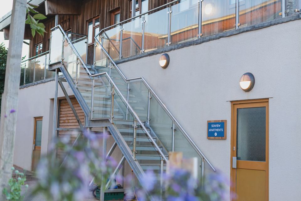 Lodge block with glass stairs
