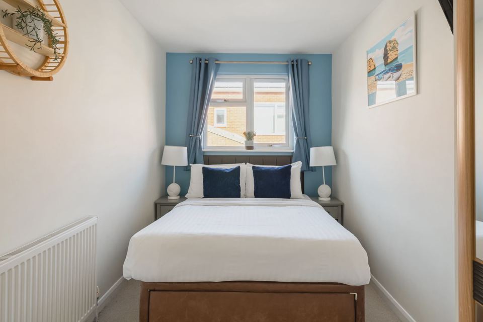Bedroom with blue walls