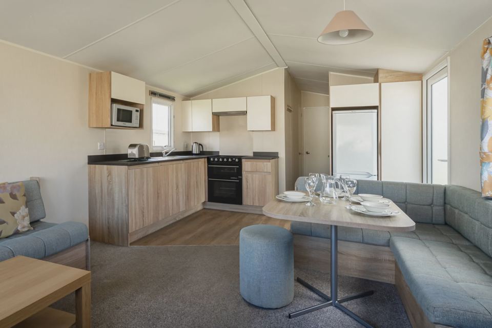 Open-plan kitchen and sofa