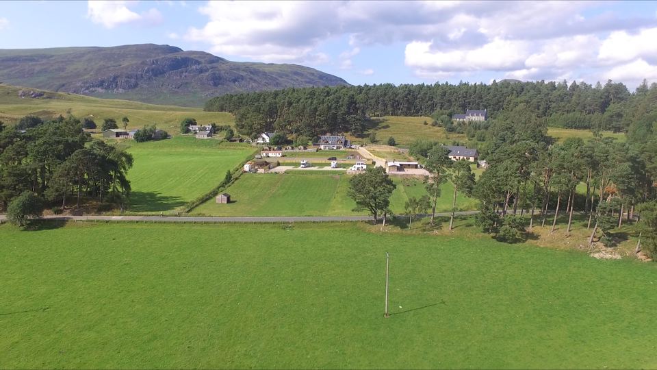 Fields and woods by the site