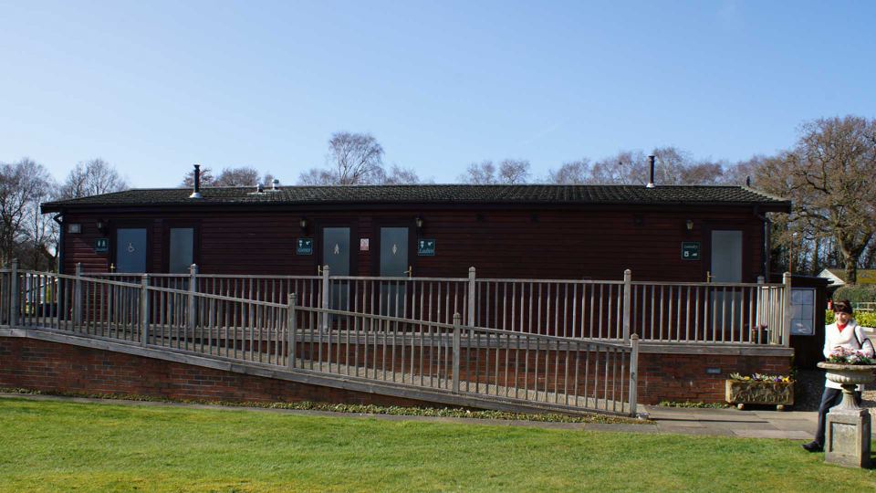 Amenity building with ramp