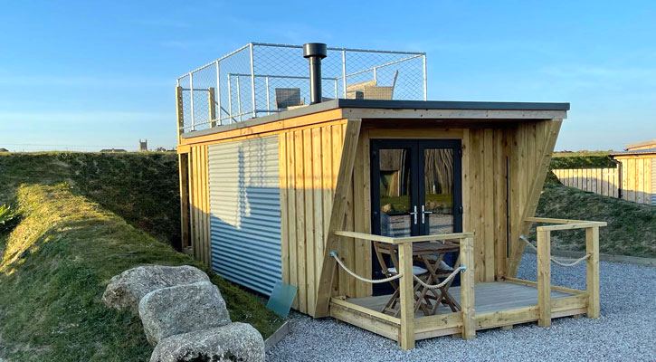 Wooden cabin with rooftop deck