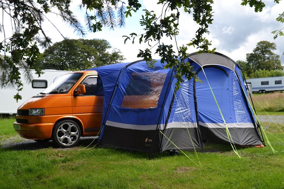 Tent beside a campervan