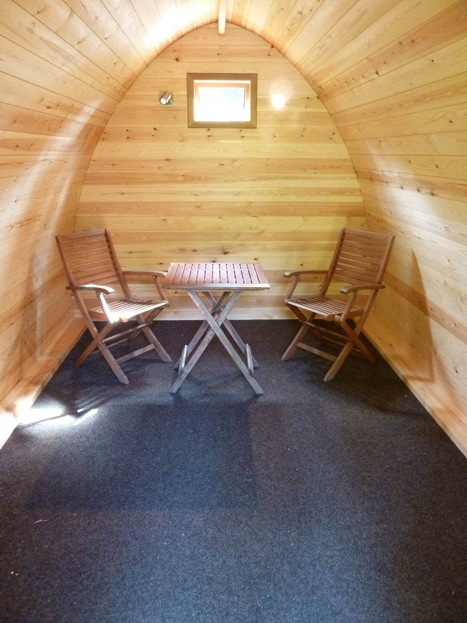 Pod interior with table and chairs
