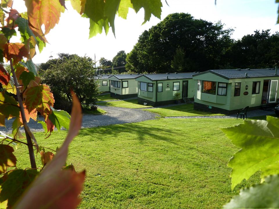 Static caravans across the lawn