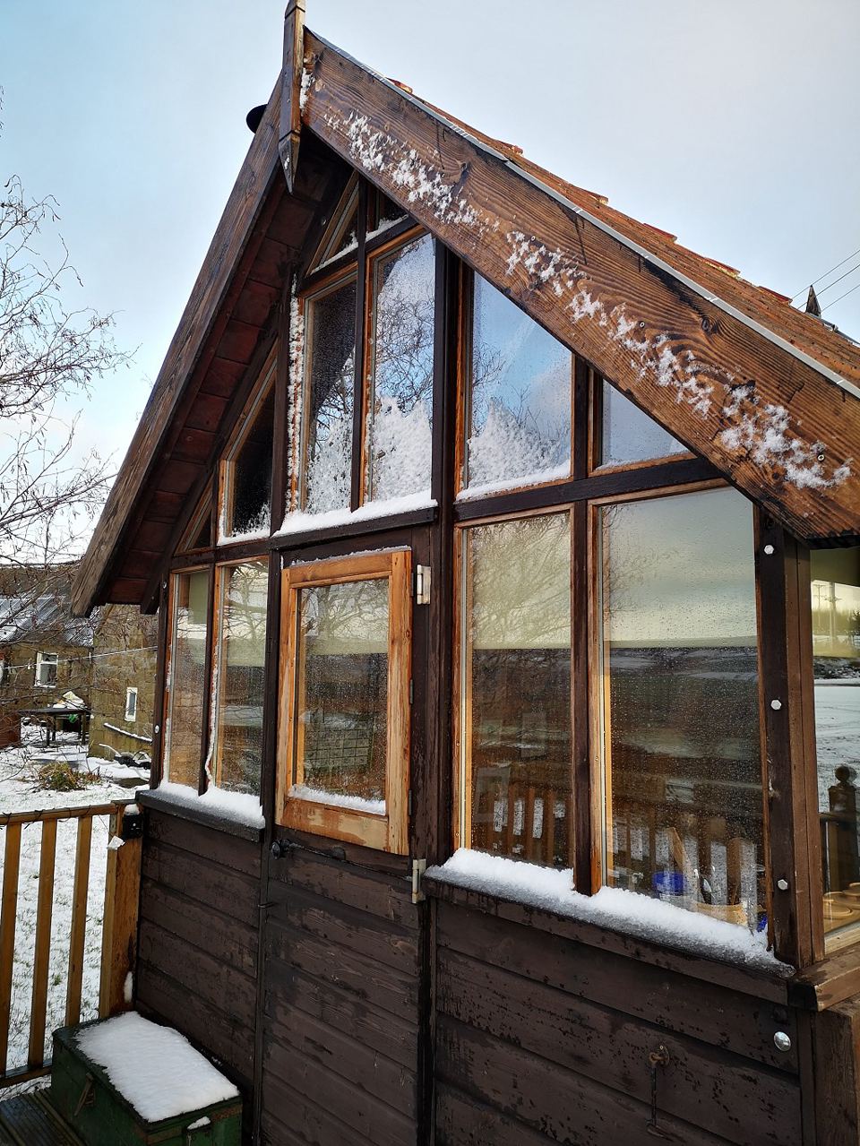 Wooden cabin with glazed gable