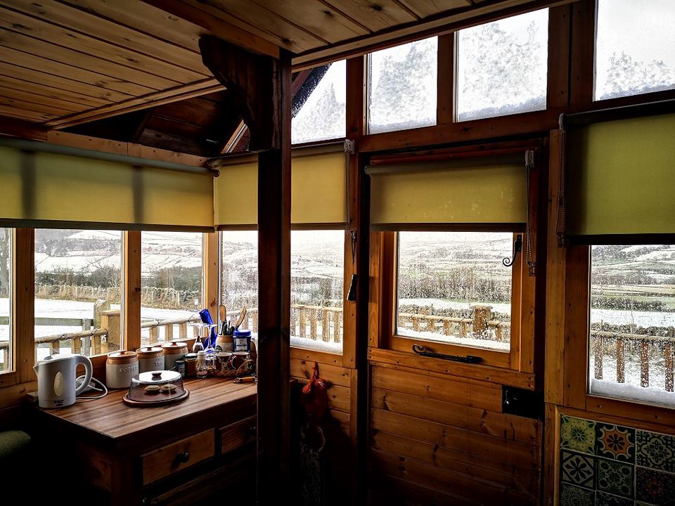 Inside the cabin with moor views