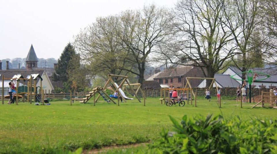Play area with the church behind