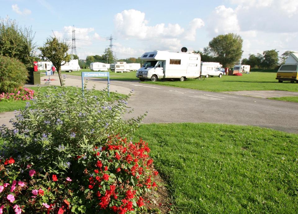 Touring pitches and flower beds