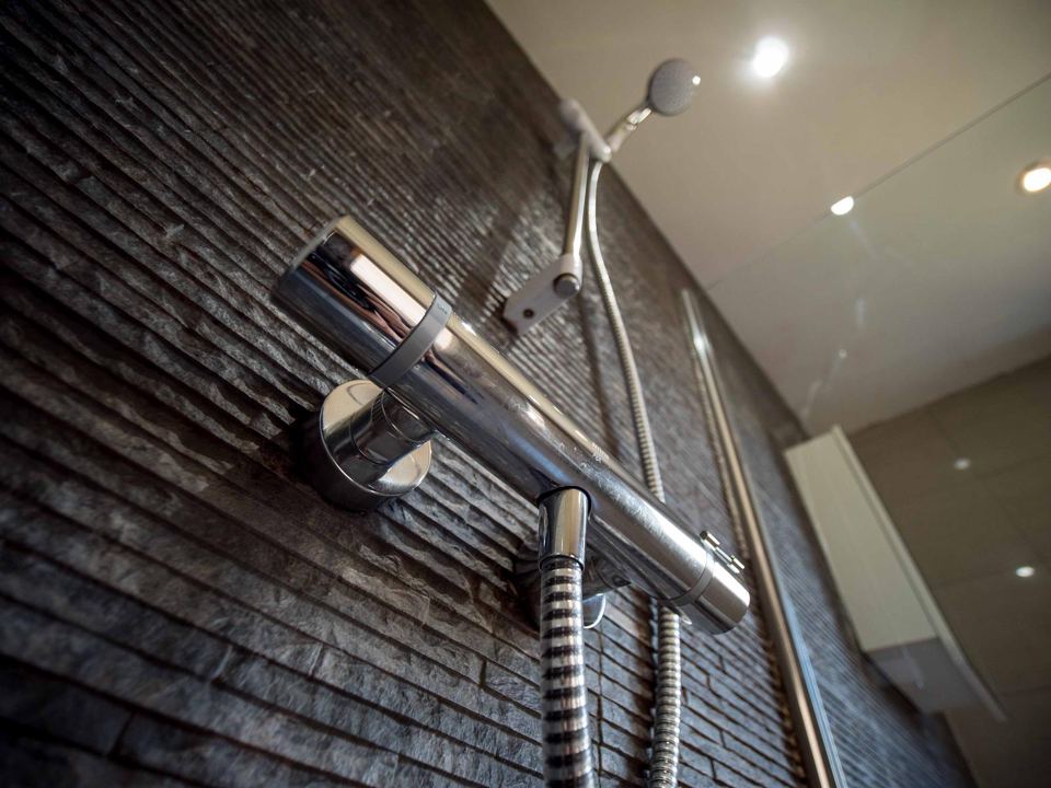 Shower head in the lodge bathroom