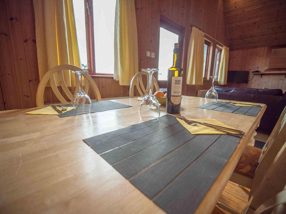 Dining table set for dinner