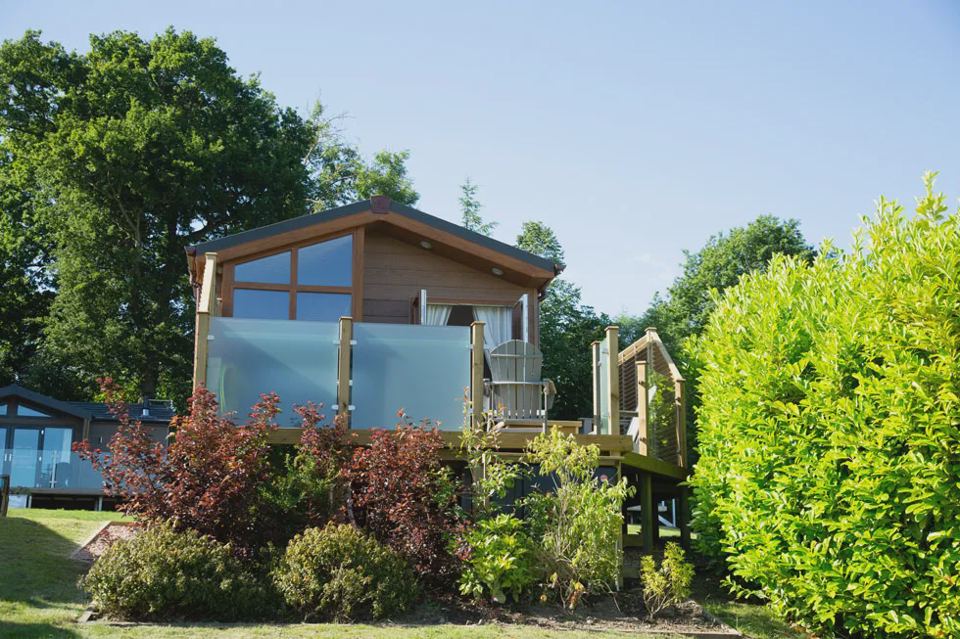 Lodge deck among shrubs