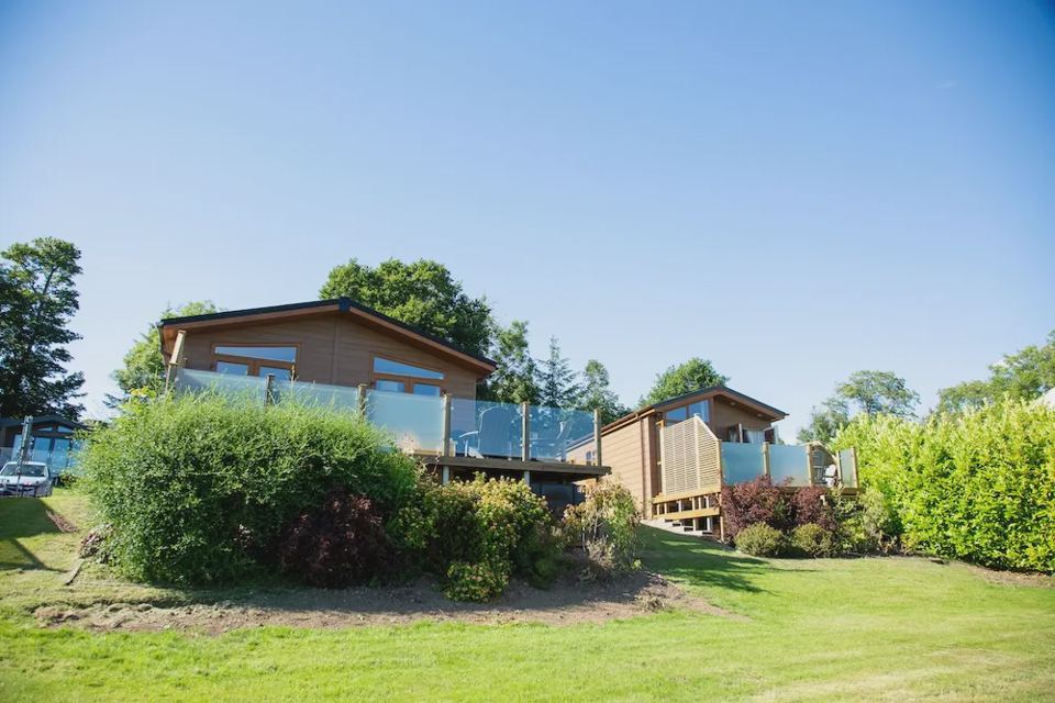 Lodge with glass-fronted deck