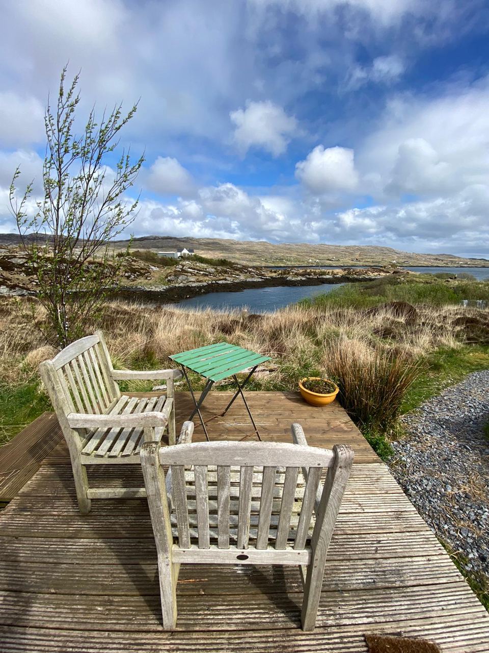 Seats on the deck over the loch