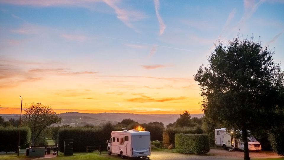 Motorhome pitch at dusk