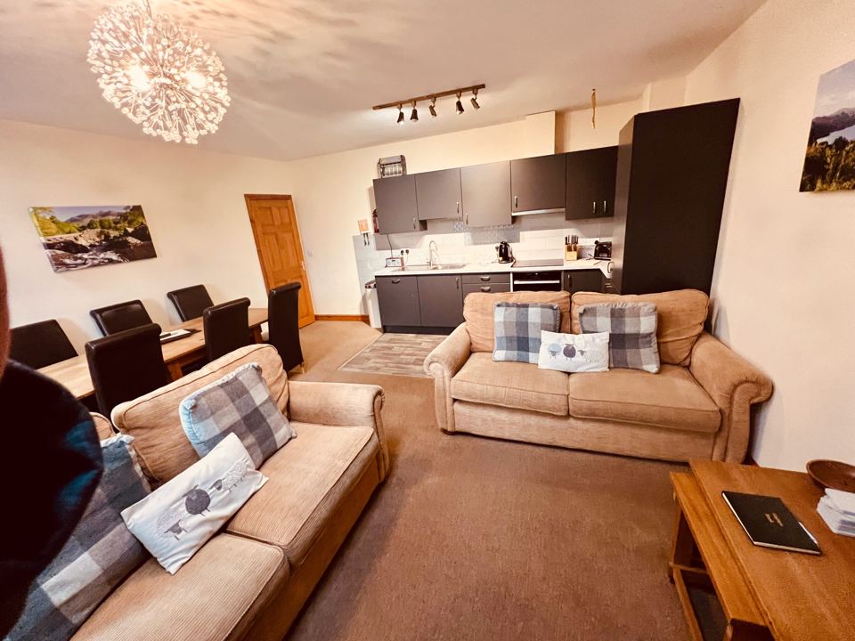 Lounge with kitchen at the back