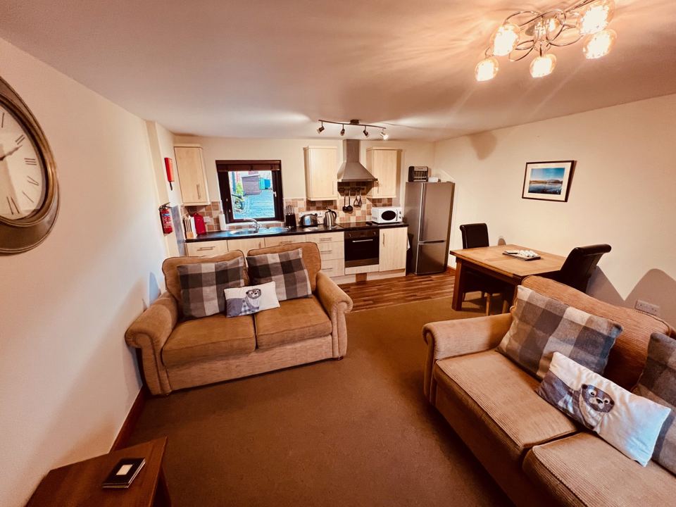 Kitchen and sofas in the lounge
