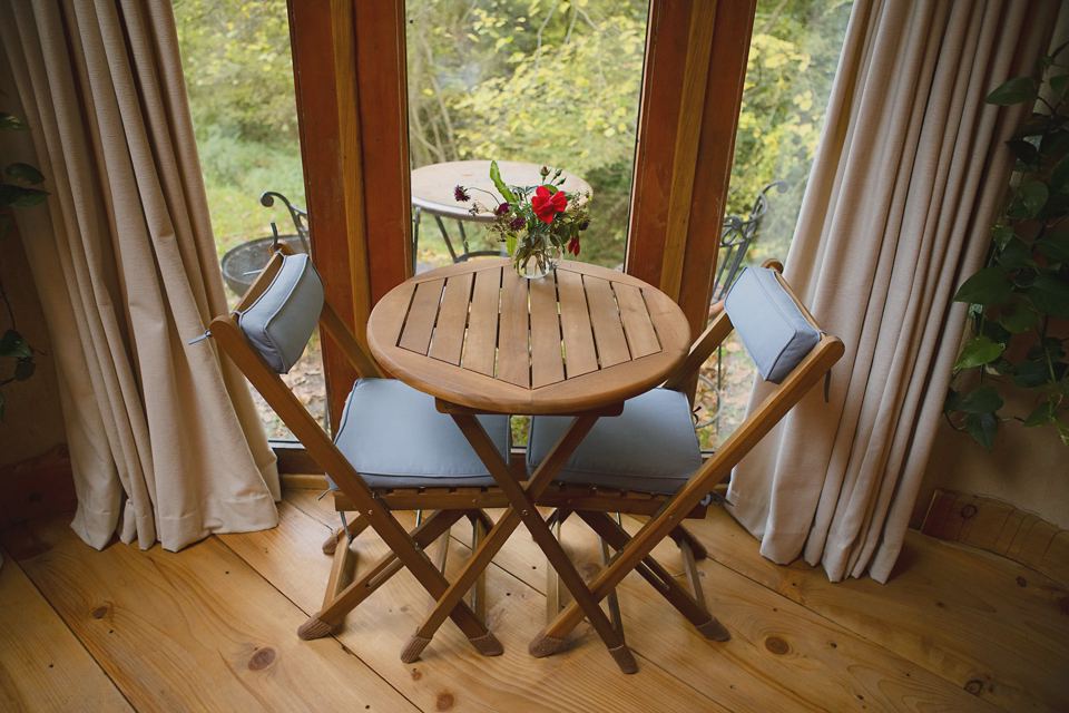 Table and chairs by the window