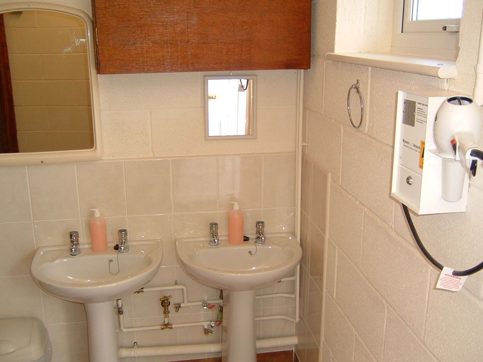 Washroom basins and hairdryer