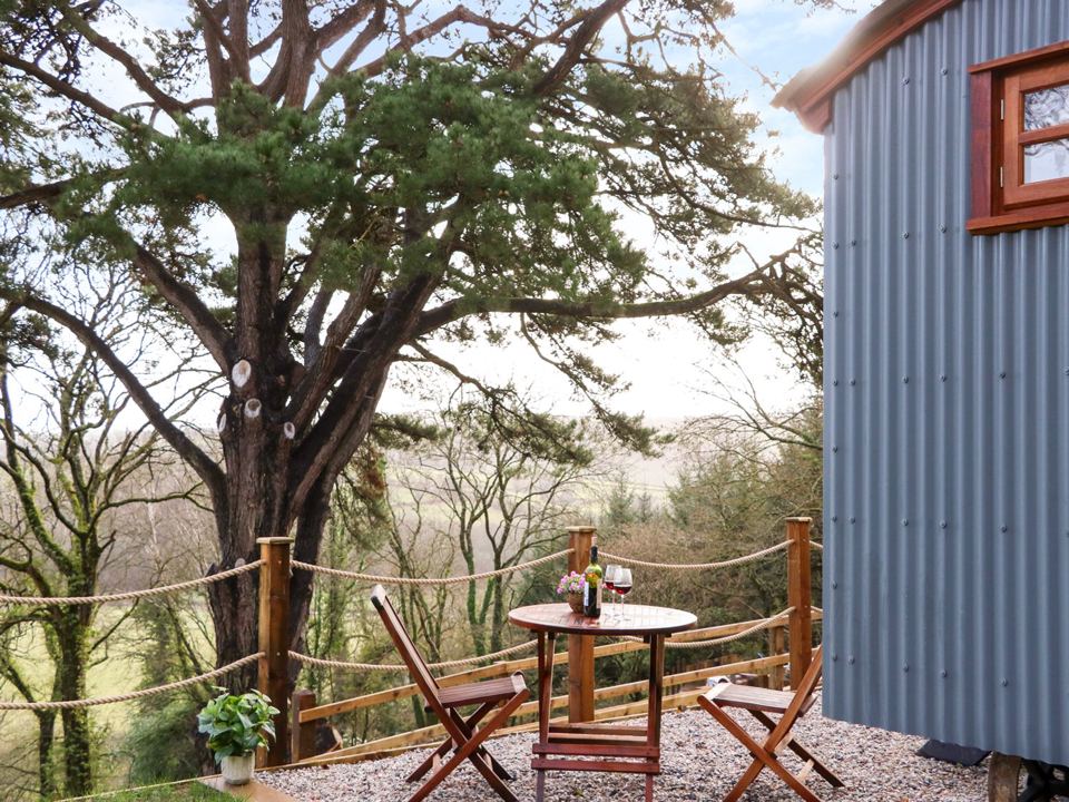 Shepherd's hut with decked table
