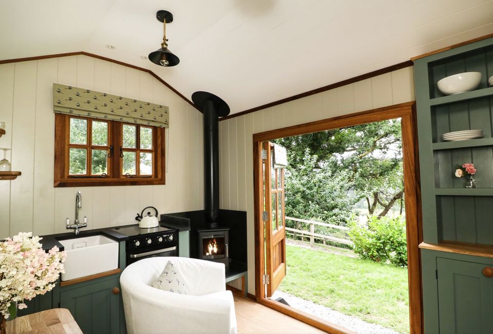 Kitchen with wood burner and garden