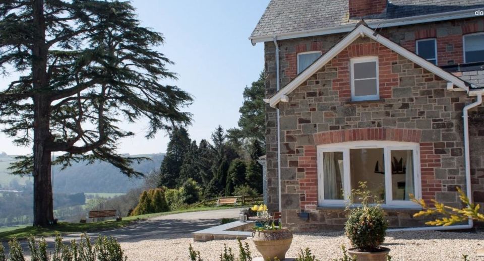 Stone cottage exterior with garden