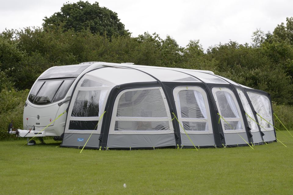Caravan with awning on the grass