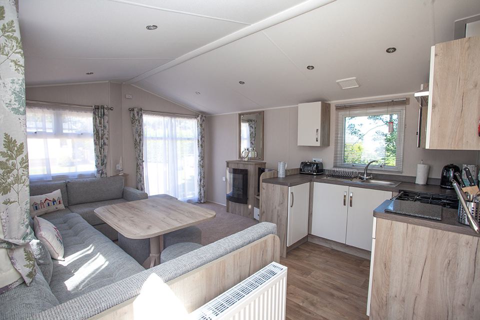 Lounge and kitchen inside the caravan
