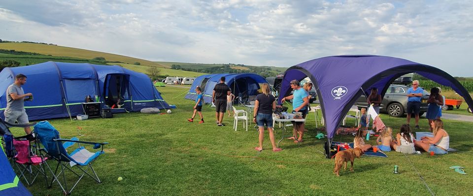 Campers on the grass pitches