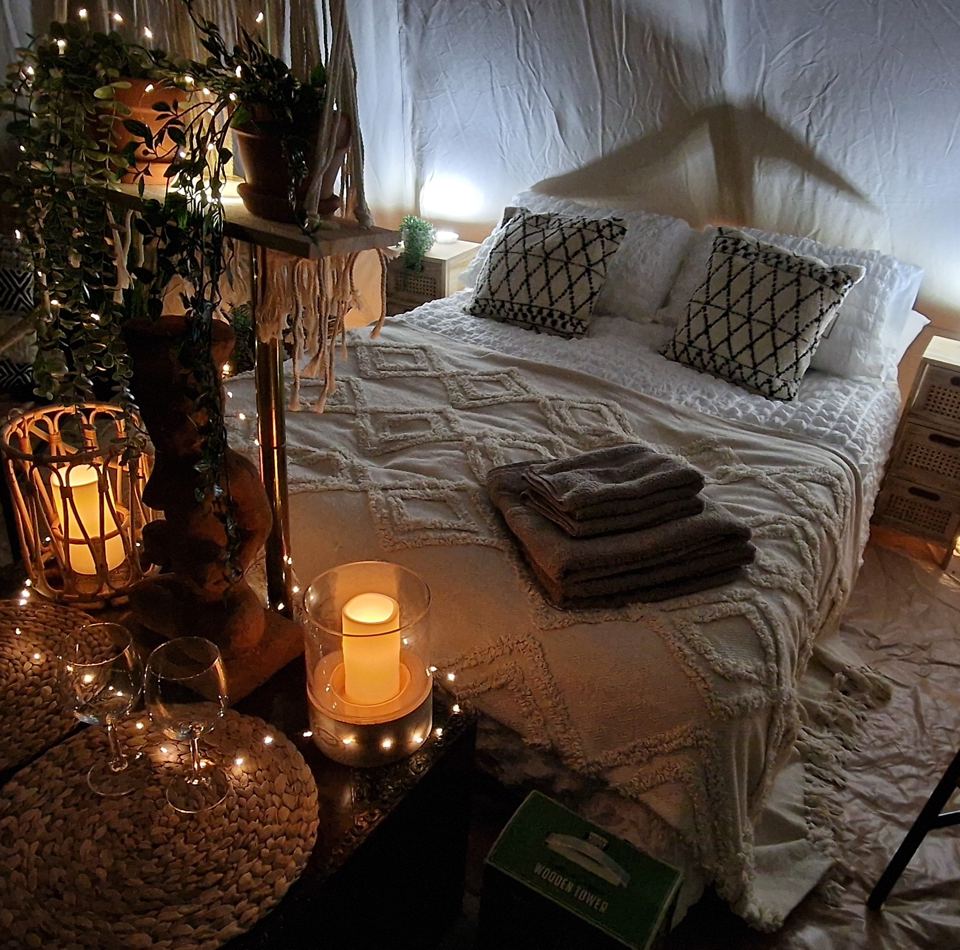 Bed inside a bell tent