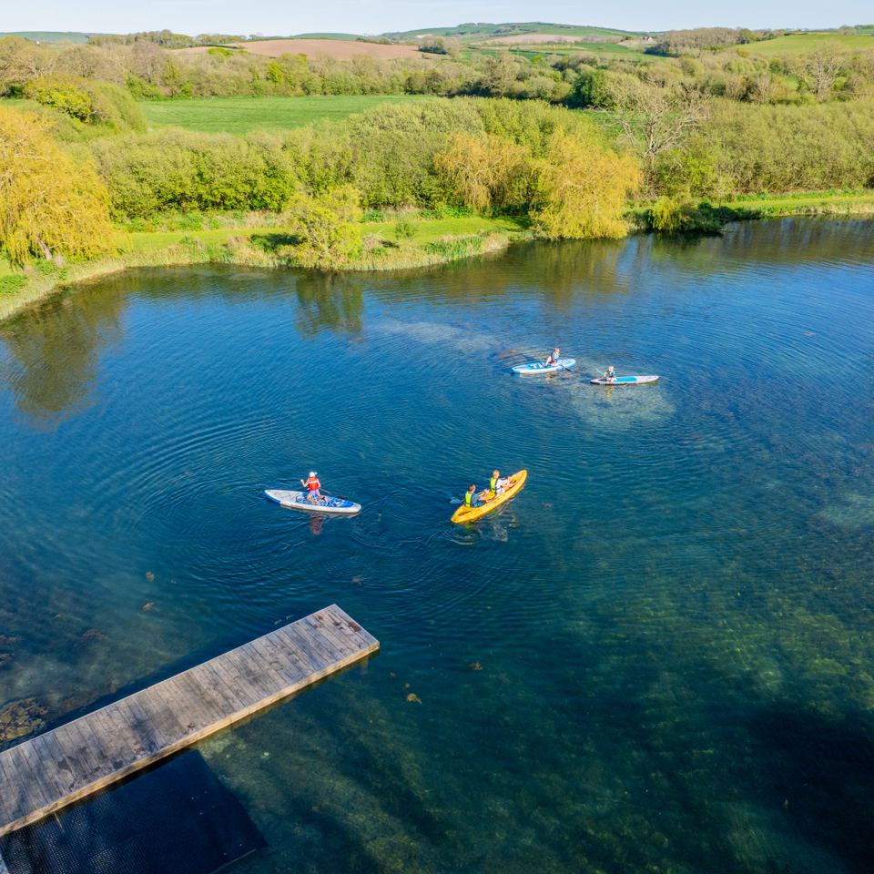 Kayaks and paddleboards on the lake