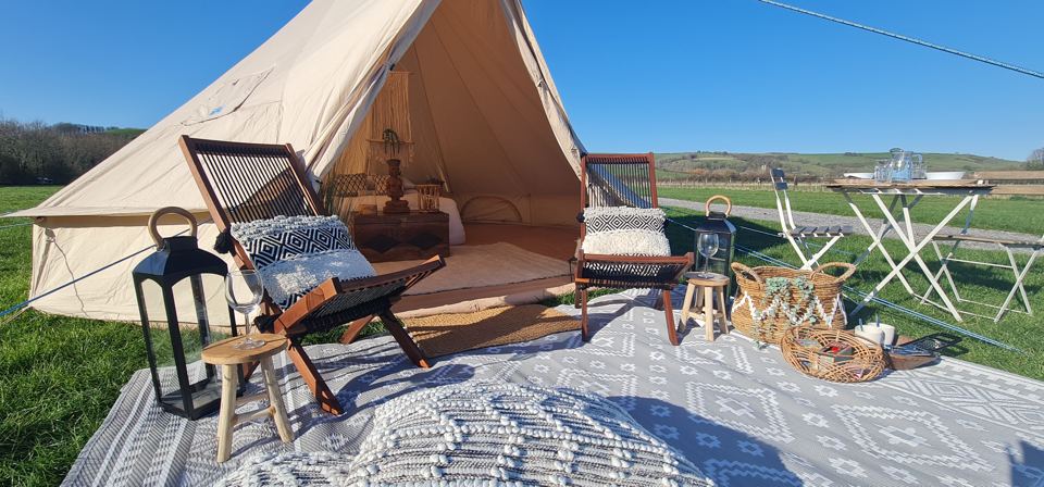 Bell tent with seating outside
