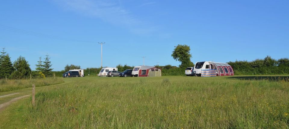 Caravans spread across the field